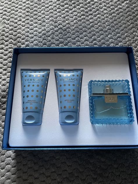 versace clothing set|Versace aftershave set.